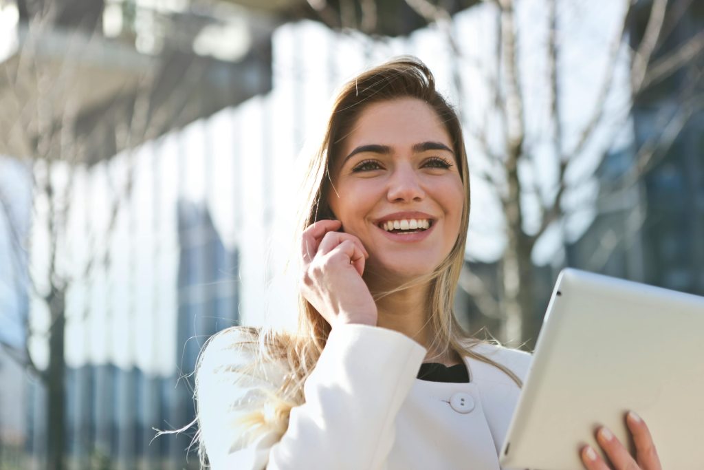 Confident smile after professional teeth whitening Vancouver
