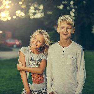 Children smiling: Understanding what age can you whiten your teeth.